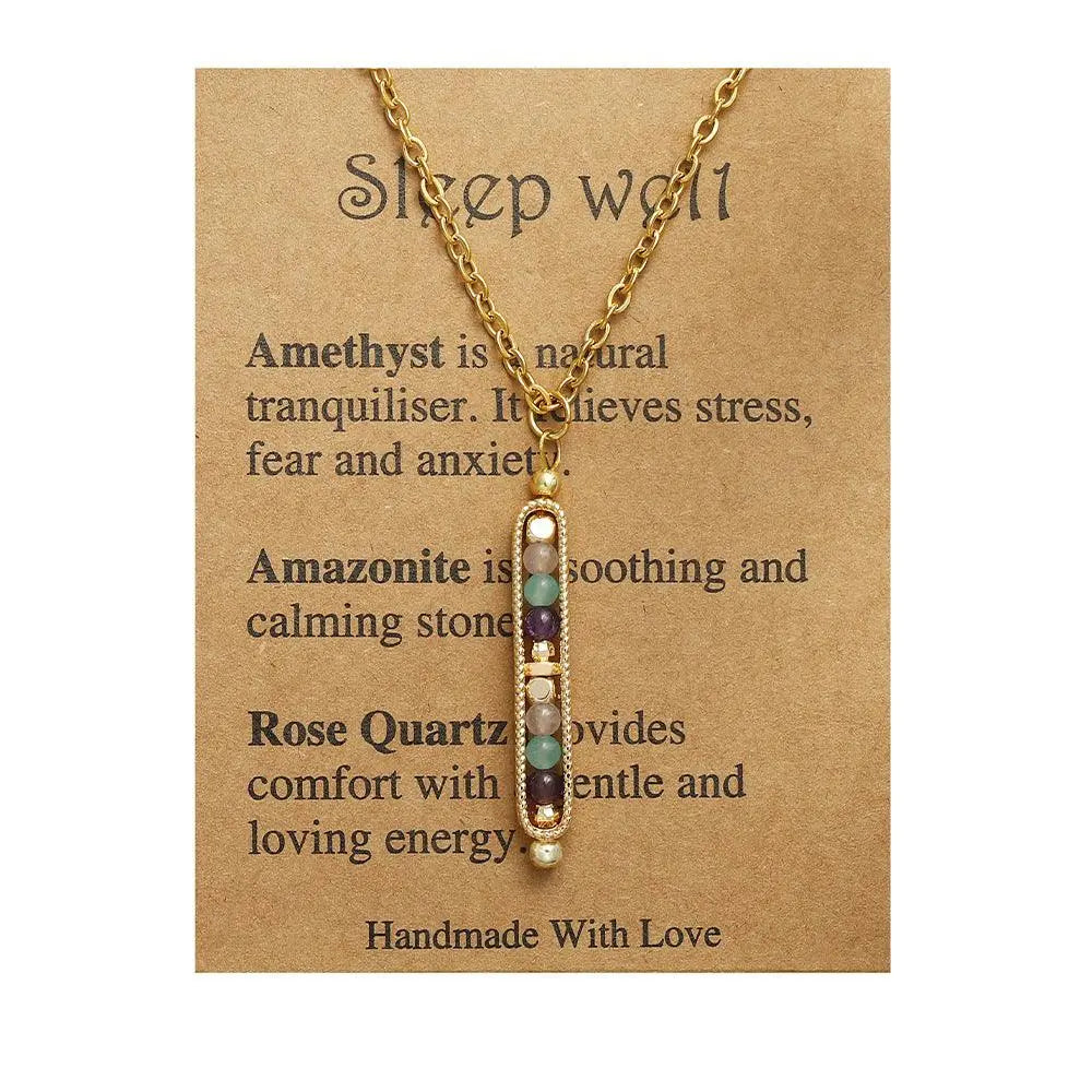 Light luxury gemstone pendant necklace with amethyst, amazonite, and rose quartz on a card with healing properties.