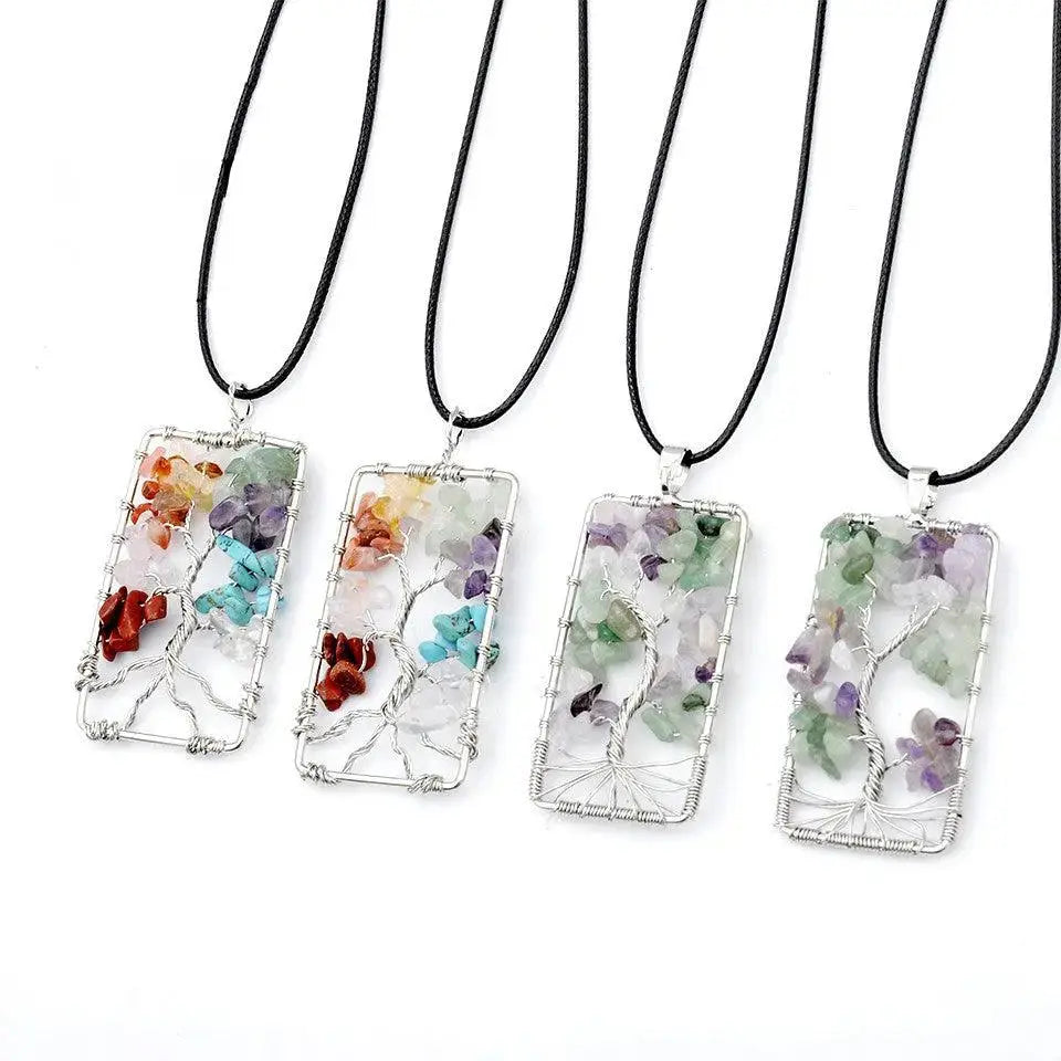 Colorful Tree of Life pendants with gravel stones, handcrafted and framed in silver wire on leather cords.